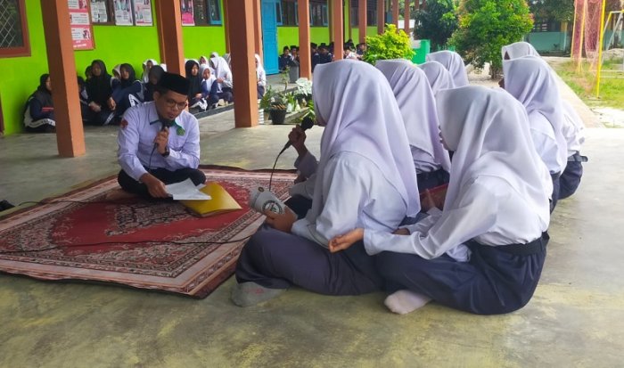 Saat Langit Meredup, Ayat-Ayat Suci Menjadi Cahaya: Gema Tahfidz di MTsN 4 Bungo Saat Langit Meredup, Ayat-Ayat Suci Menjadi Cahaya: Gema Tahfidz di MTsN 4 Bungo
